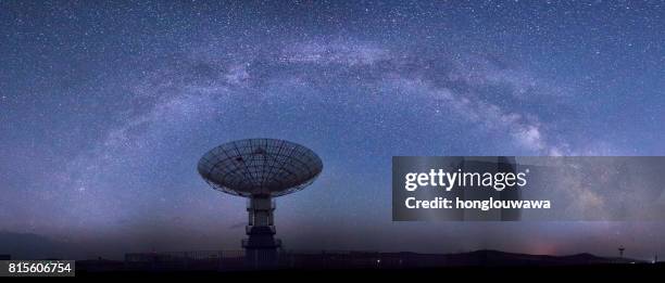 galaxy and radio telescope - satellite dish stock pictures, royalty-free photos & images
