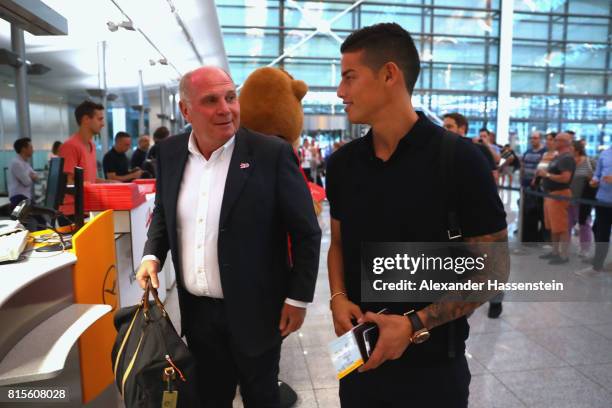 Uli Hoeness, President of FC Bayern Muenchen talks to James Rodriguez prior their team flight to Shanghai for the FC Bayern Muenchen Pre-Season Tour...