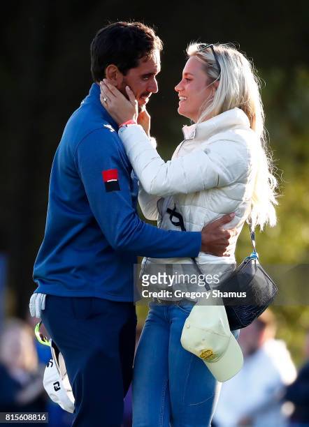 Rafa Cabrera-Bello of Spain celebrates victory on the 1st play off hole with girlfriend Sofia Lundstedt during the final round of the AAM Scottish...