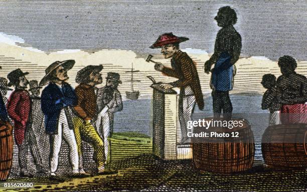 Auctioning slaves in the West Indies after their transportation from West Africa. From Rev. Isaac Taylor "Scenes in Africa" London 1824....