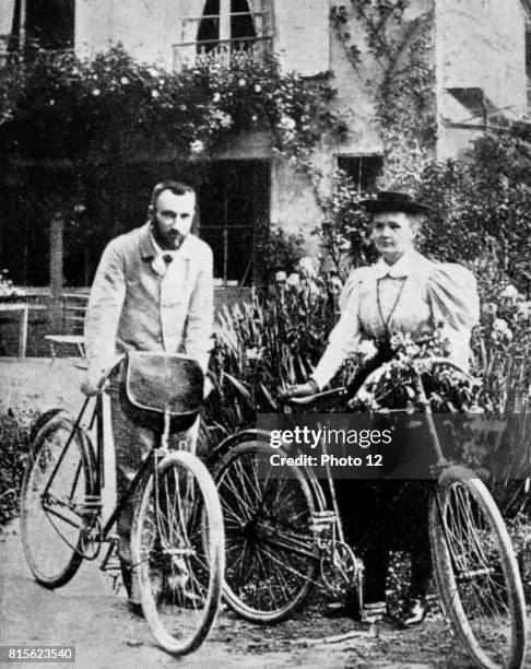 Marie and Pierre Curie pictured in their early married life when they enjoyed cycling in the French countryside.