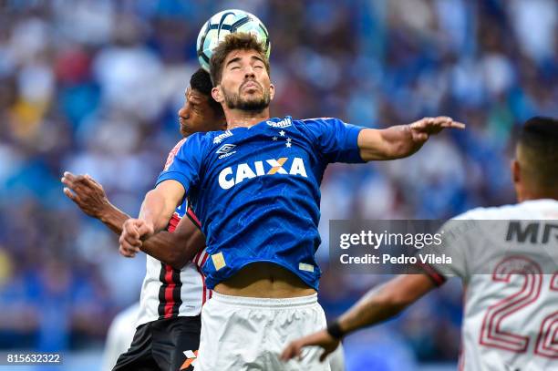 Lucas Silva of Cruzeiro and Marcio Araujo of Flamengo battle for the ball during a match between Cruzeiro and Flamengo as part of Brasileirao Series...