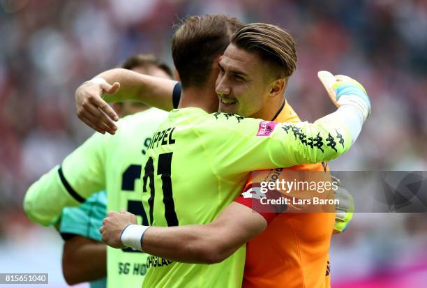 Goalkeeper Tobias Sippel of Moenchengladbach hughs Ermin Bicakcic of Hoffenheim during the Telekom Cup 2017 3rd place match between Borussia...