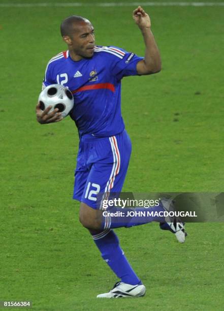 French forward Thierry Henry runs with the ball after scoring during the Euro 2008 Championships Group C football match Netherlands vs. France on...