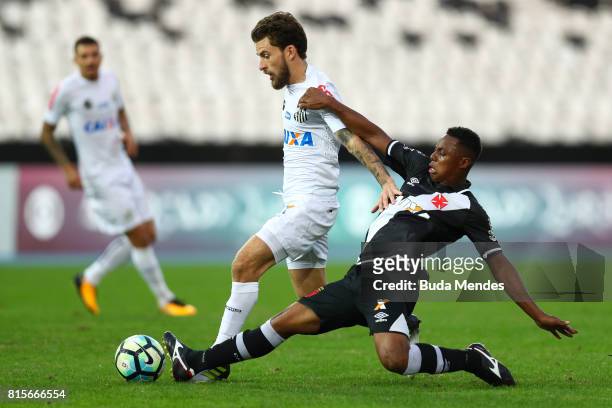 Wellington of Vasco da Gama struggles for the ball with Lucas Lima of Santos during a match between Vasco da Gama and Santos as part of Brasileirao...