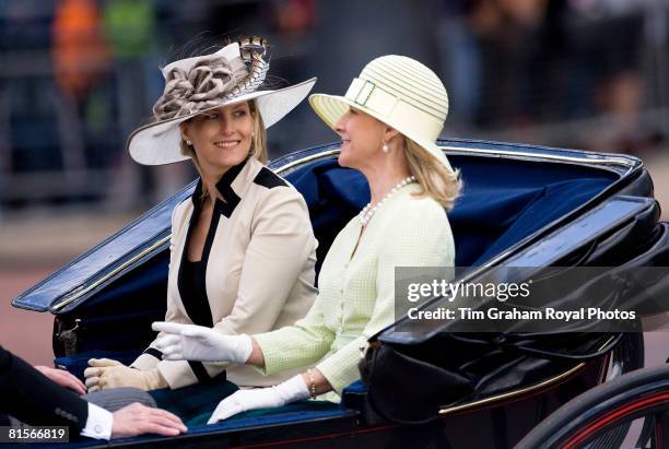 Sophie Rhys-Jones, Countess of Wessex and the Duchess of Gloucester travel in a horse drawn carriage during the Trooping The Colour outside...