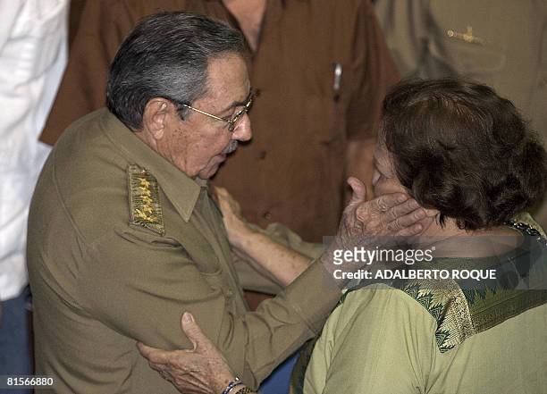 Cuban President Raul Castro greets the widow of Ernesto "Che" Guevara, Aleida Guevara March, in Havana on June 13, 2008 during a cultural gala for...
