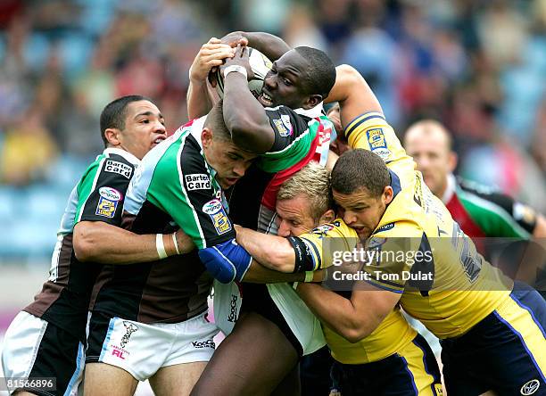 Lamont Bryan of Harlequins RL forces through Leeds Rhinos defence during the engage Super League match between Harlequins RL and Leeds Rhinos at The...