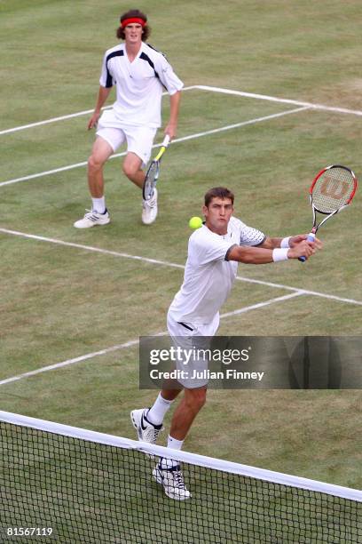 Maz Mirnyi of Belarus and Jamie Murray of Great Britain in action during the Men's Doubles Semi Final match against Marcelo Melo of and Andre Sa of...