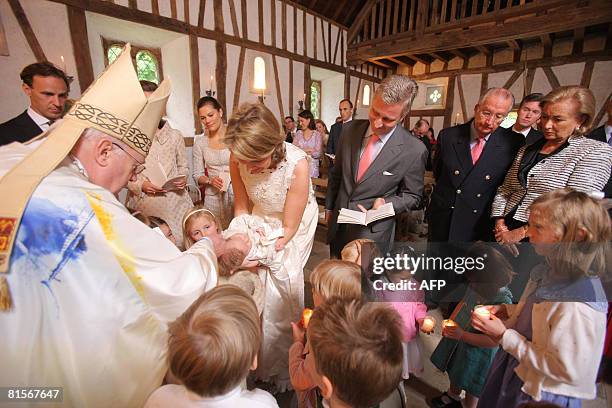 Cardinal Godfried Danneels , Princess Mathilde and Prince Philippe and their daughter Princess Eleonore attend the baptism ceremony of Princess...