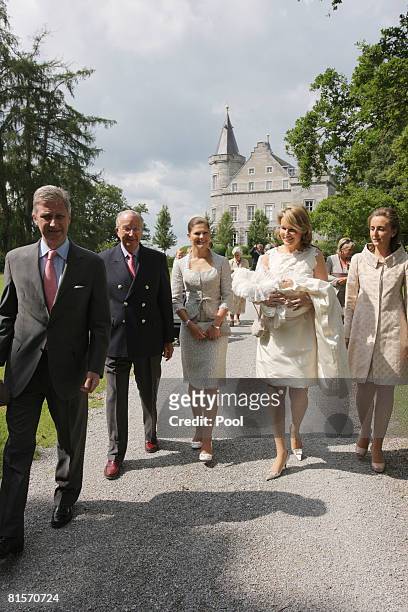 Prince Philippe of Belgium, King Albert of Belgium, Princess Victoria of Sweden, Princess Mathilde of Belgium carrying Princess Eleonore of Belgium...
