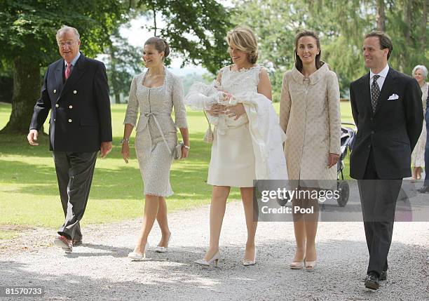 King Albert of Belgium, Princess Victoria of Sweden and Princess Mathilde of Belgium carrying Princess Eleonore of Belgium, Princess Claire of...