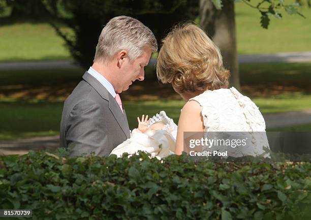 Prince Philippe of Belgium and Princess Mathilde of Belgium hold Princess Eleonore of Belgium at the baptism of Princess Eleonore at the Chapel of...