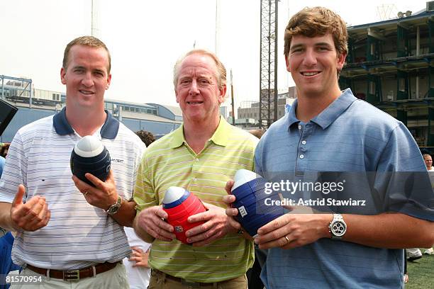 Indianapolis Colts quarterback Peyton Manning, Archie Manning and New York Giants quarterback Eli Manning attends the NERF Father's Day Football...