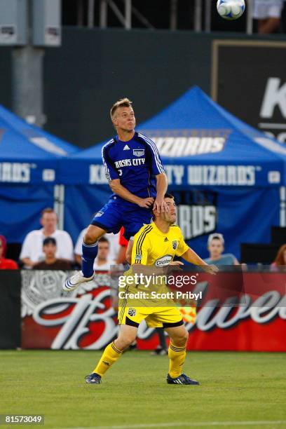 Michael Harrington of the Kansas City Wizards goes up for a head ball against Jason Garey of the Columbus Crew on June 14, 2008 at CommunityAmerica...