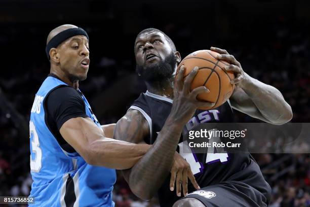 Ivan Johnson of the Ghost Ballers handles the ball against Jerome Williams of Power during week four of the BIG3 three on three basketball league at...