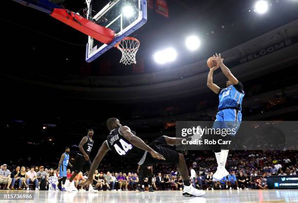 Jerome Williams of Power shoots against Ivan Johnson of the Ghost Ballers during week four of the BIG3 three on three basketball league at Wells...