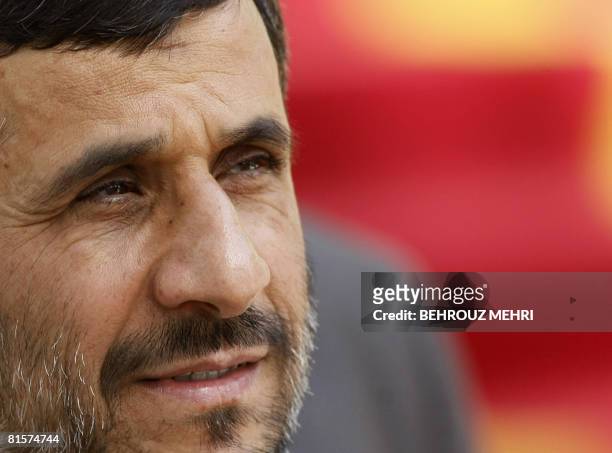 Iranian President Mahmoud Ahmadinejad waits for the arrival of his Comoran counterpart Ahmed Abdallah Mohamed Sambi in Tehran on June 15, 2008. Sambi...