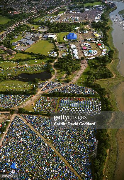 The crowd watch an act at The Isle Wight Festival on June 14, 2008 in Newport, Isle of Wight. The festival, attended by 50,000 music fans, which...