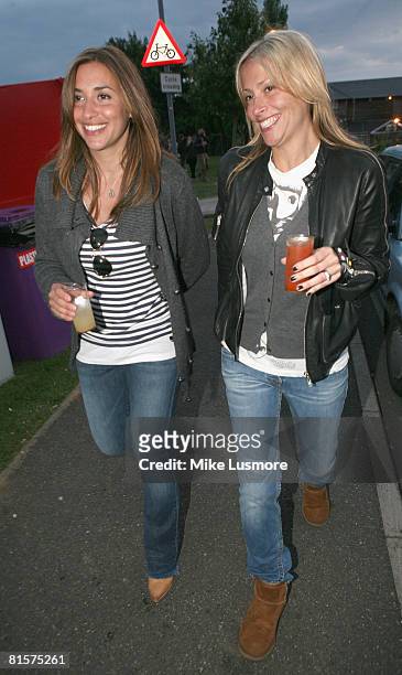Melanie Blatt and Nicole Appleton from the All Saints relax with a drink backstage at the Isle of Wight Festival on June 14, 2008 in the Isle of...