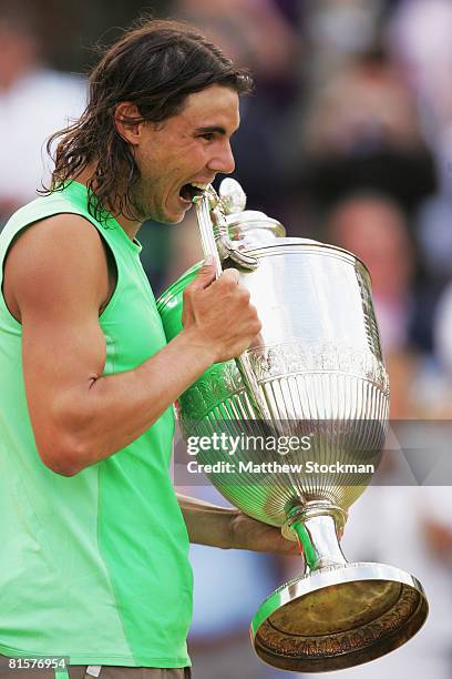 Rafael Nadal of Spain celebrates with the trophy after he won the Men's Singles Final match against Novak Djokovic of Serbia on Day 7 of the Artois...