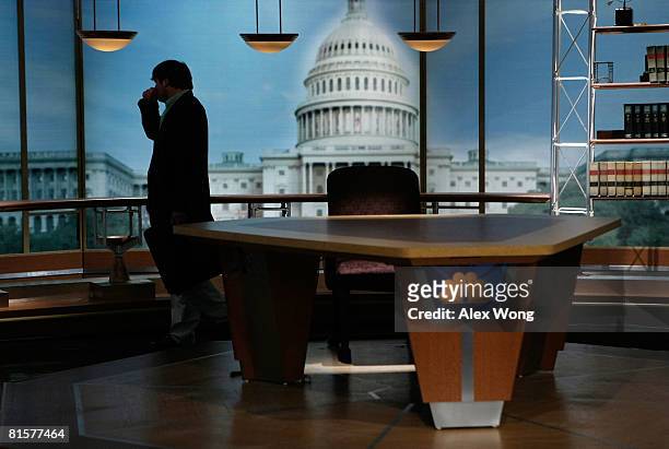 Luke Russert, son of the late moderator of "Meet the Press" Tim Russert, mourns his father at the set of the show after a taping June 15, 2008 at the...