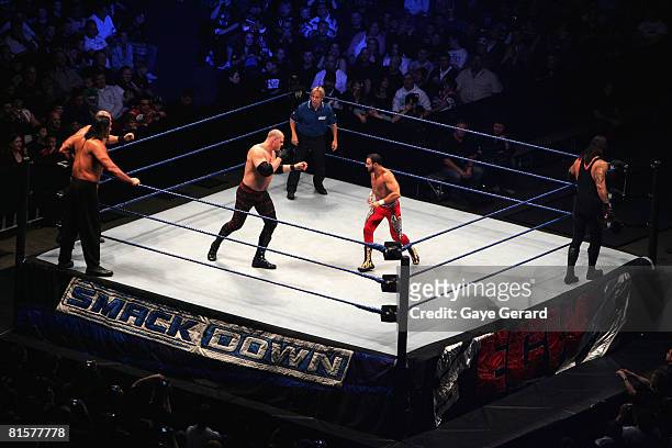 Champion Kane faces off against Chavo Guerrero during WWE Smackdown at Acer Arena on June 15, 2008 in Sydney, Australia.