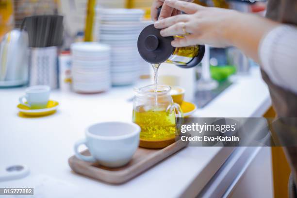 making a tea - chamomile tea stock pictures, royalty-free photos & images