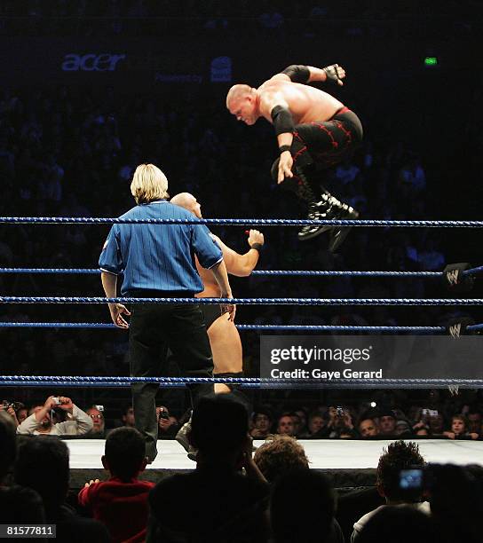 Champion Kane leaps fromt he turnbuckle against Bam Neely during WWE Smackdown at Acer Arena on June 15, 2008 in Sydney, Australia.