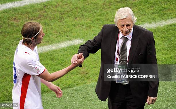 Coach of the Czech national football team Karel Bruckner shakes hands with Czech midfielder Jaroslav Plasil after he scored a goal during the Euro...