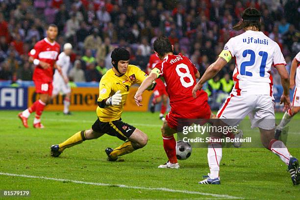 Nihat Kahveci of Turkey celebrates after scoring his team's second goal past goalkeeper Petr Cech of Czech Republic during the UEFA EURO 2008 Group A...