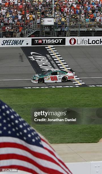 Dale Earnhardt, Jr., driving the National Guard/AMP Energy Chevrolet, drives during a caution lap at the end of the NASCAR Sprint Cup Series Lifelock...