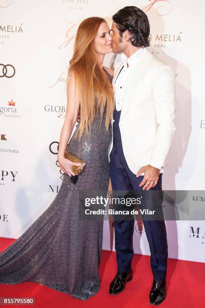 Olivia de Borbón and Julián Porras attend the Global Gift Gala 2017 red carpet at Gran Melia Don Pepe Resort on July 16, 2017 in Marbella, Spain.