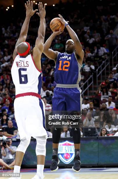 Al Thornton of 3's Company shoots against Bonzi Wells of Tri-State during week four of the BIG3 three on three basketball league at Wells Fargo...