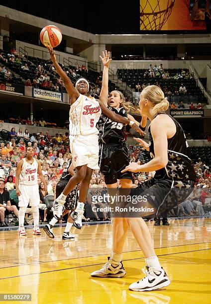 Sherill Baker of the Indiana Fever shoots over Becky Hammon of the San Antonio Silver Stars at Conseco Fieldhouse on June 15, 2008 in Indianapolis,...