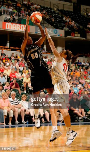 Vickie Johnson of the San Antonio Silver Stars shoots over Tully Bevilaqua of the Indiana Fever at Conseco Fieldhouse on June 15, 2008 in...