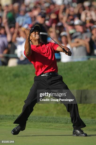 Tiger Woods reacts to his birdie putt on the 18th green to force a playoff with Rocco Mediate during the final round of the 108th U.S. Open at the...