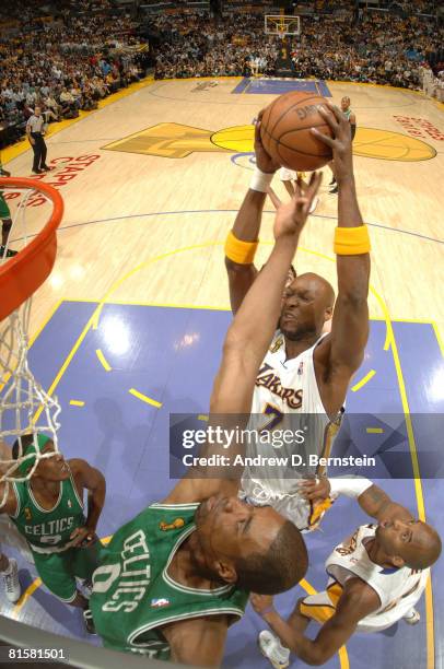 Lamar Odom of the Los Angeles Lakers pulls down a rebound against Leon Powe of the Boston Celtics in Game Five of the 2008 NBA Finals at Staples...