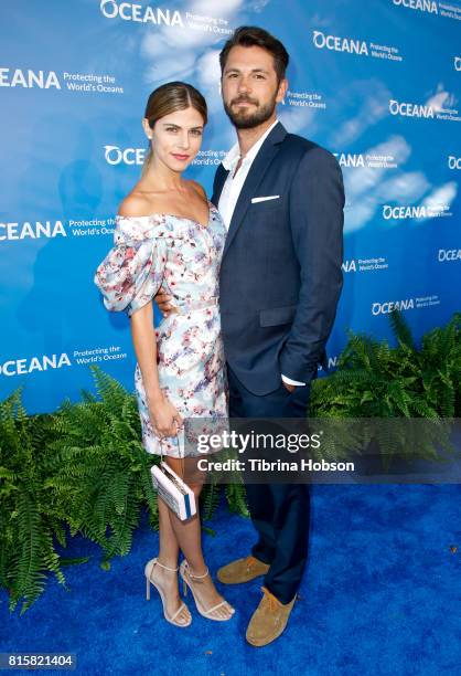 Stephanie Cayo and Guest attend the 10th annual Oceana SeaChange Summer Party at Private Residence on July 15, 2017 in Laguna Beach, California.