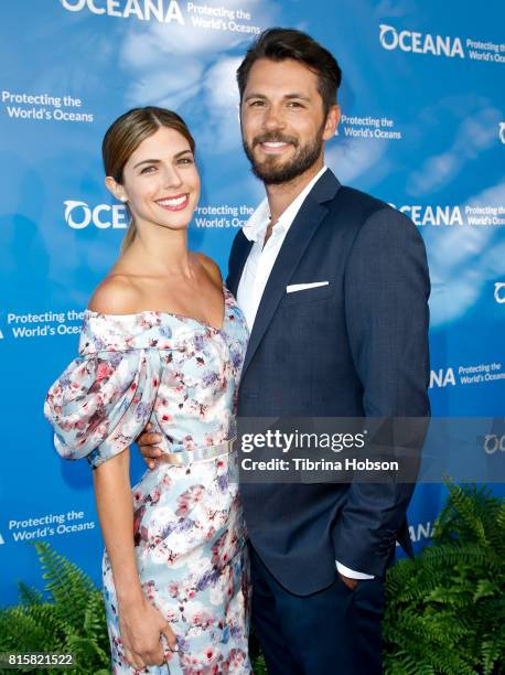 Stephanie Cayo and Guest attend the 10th annual Oceana SeaChange Summer Party at Private Residence on July 15, 2017 in Laguna Beach, California.