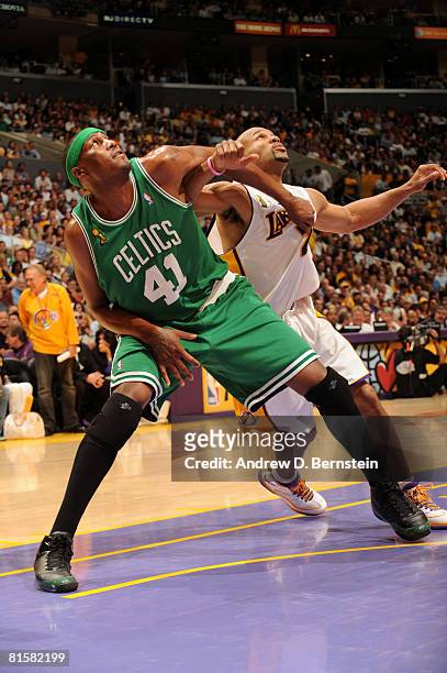 James Posey of the Boston Celtics boxes out against Derek Fisher of the Los Angeles Lakers in Game Five of the 2008 NBA Finals at Staples Center on...