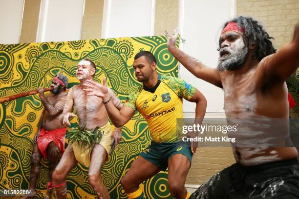 Kurtley Beale dances with Indigenous performers during the Wallabies Indigenous Jersey Launch at the National Centre of Indigenous Excellence on July...