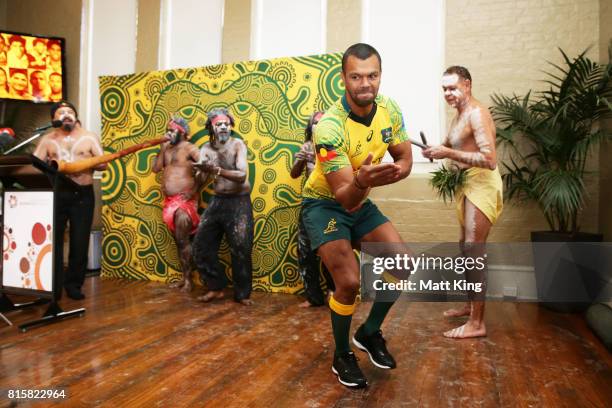 Kurtley Beale dances with Indigenous performers during the Wallabies Indigenous Jersey Launch at the National Centre of Indigenous Excellence on July...