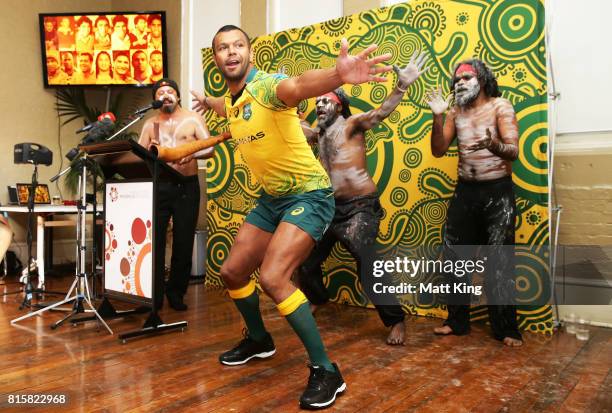 Kurtley Beale dances with Indigenous performers during the Wallabies Indigenous Jersey Launch at the National Centre of Indigenous Excellence on July...