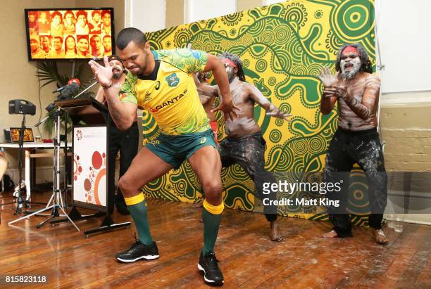 Kurtley Beale dances with Indigenous performers during the Wallabies Indigenous Jersey Launch at the National Centre of Indigenous Excellence on July...