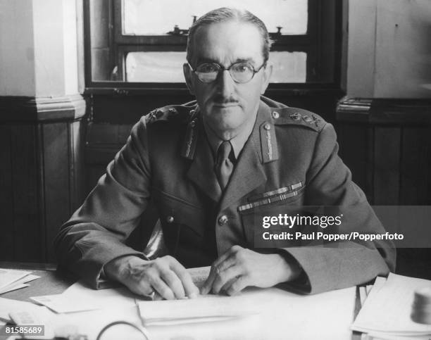 Lieutenant General Alan Brooke pictured at his desk in London shortly after his appointment as Commander-in-Chief, Home Forces, giving him...