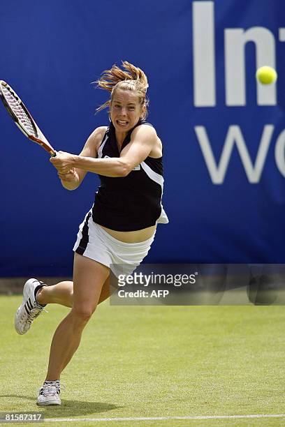 British tennis player Katie O'Brien in action against Australian tennis player Samantha Stosur during the first day of the International Women's...