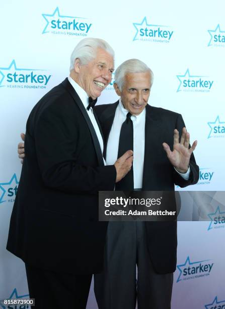 Bill Austin and Sid Hartman pose on the red carpet at the 2017 Starkey Hearing Foundation So the World May Hear Awards Gala at the Saint Paul...