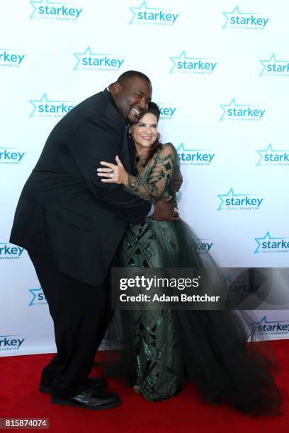 Quinton Aaron and Tani Austin pose on the red carpet at the 2017 Starkey Hearing Foundation So the World May Hear Awards Gala at the Saint Paul...