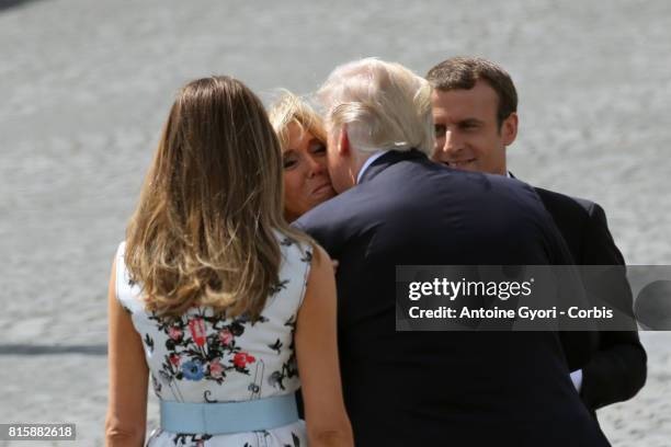 President Donald Trump and his wife Melania Trump, French President Emmanuel Macron and his wife Brigitte Trogneux Greeting during the traditional...